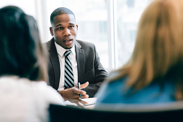 Two women at a meeting with a financial advisor